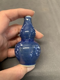 Three Chinese powder blue-ground blue and white snuff bottles and one blue and white snuff bottle, 19th C.