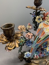 A pair of candle holders mounted with Chinese famille rose models of pheasants, Qianlong