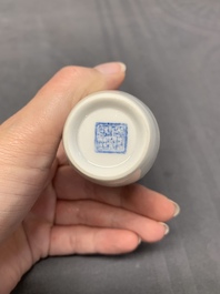 A varied collection of five Chinese famille rose, grisaille and iron-red porcelain, 20th C.