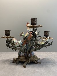 A pair of candle holders mounted with Chinese famille rose models of pheasants, Qianlong