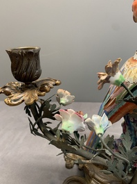 A pair of candle holders mounted with Chinese famille rose models of pheasants, Qianlong