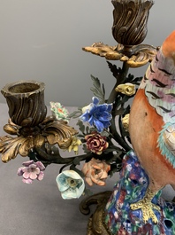 A pair of candle holders mounted with Chinese famille rose models of pheasants, Qianlong