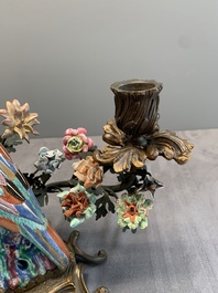 A pair of candle holders mounted with Chinese famille rose models of pheasants, Qianlong