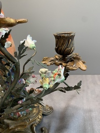A pair of candle holders mounted with Chinese famille rose models of pheasants, Qianlong