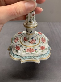 A pair of rare Chinese export famille rose candlesticks with floral design, Yongzheng/Qianlong