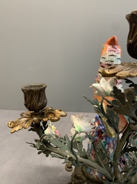 A pair of candle holders mounted with Chinese famille rose models of pheasants, Qianlong