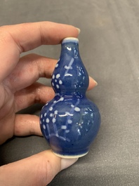 Three Chinese powder blue-ground blue and white snuff bottles and one blue and white snuff bottle, 19th C.