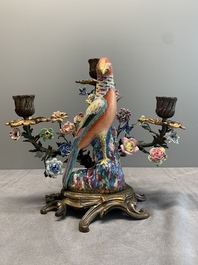 A pair of candle holders mounted with Chinese famille rose models of pheasants, Qianlong