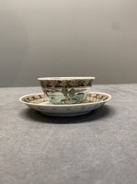 A fine Chinese famille rose 'apple pickers' cup and saucer, Yongzheng