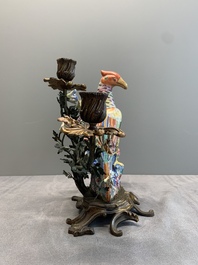 A pair of candle holders mounted with Chinese famille rose models of pheasants, Qianlong