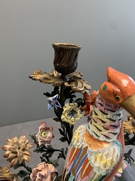 A pair of candle holders mounted with Chinese famille rose models of pheasants, Qianlong