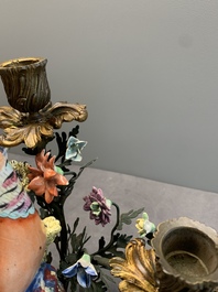 A pair of candle holders mounted with Chinese famille rose models of pheasants, Qianlong