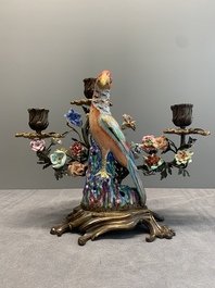A pair of candle holders mounted with Chinese famille rose models of pheasants, Qianlong