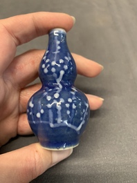 Three Chinese powder blue-ground blue and white snuff bottles and one blue and white snuff bottle, 19th C.