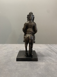 A rare Chinese bronze Vaishravana on horseback with wooden stand, Yuan
