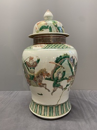 A pair of famille verte-style 'warriors on horseback' vases and covers, Samson, Paris, 19th C.