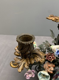A pair of candle holders mounted with Chinese famille rose models of pheasants, Qianlong