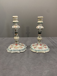 A pair of rare Chinese export famille rose candlesticks with floral design, Yongzheng/Qianlong