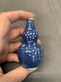 Three Chinese powder blue-ground blue and white snuff bottles and one blue and white snuff bottle, 19th C.