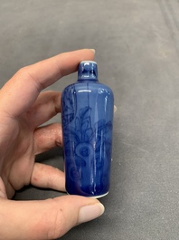 Three Chinese powder blue-ground blue and white snuff bottles and one blue and white snuff bottle, 19th C.