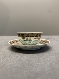 A fine Chinese famille rose 'apple pickers' cup and saucer, Yongzheng