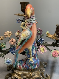 A pair of candle holders mounted with Chinese famille rose models of pheasants, Qianlong