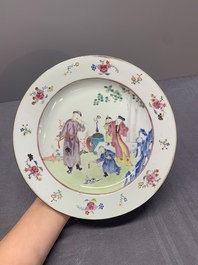 Two Chinese famille rose plates and an Imari-style armorial plate, Kangxi/Yongzheng