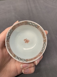 A fine Chinese famille rose 'apple pickers' cup and saucer, Yongzheng