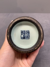 A rare Chinese blue, white and iron-red celadon-ground 'pomegranate' 'meiping' vase, Qianlong mark and of the period