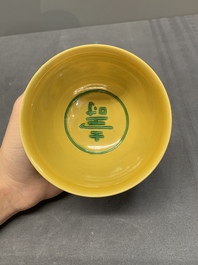 A pair of Chinese yellow-ground 'dragon' and 'shou' bowls, Guangxu mark and of the period