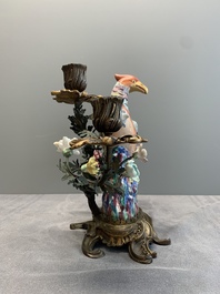 A pair of candle holders mounted with Chinese famille rose models of pheasants, Qianlong