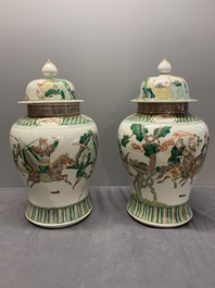 A pair of famille verte-style 'warriors on horseback' vases and covers, Samson, Paris, 19th C.