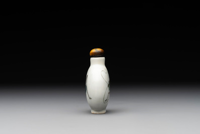 A Chinese famille rose 'grasshopper' snuff bottle, Daoguang mark and of the period