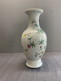 A Chinese famille rose vase with floral design, Qianlong mark, 19/20th C.