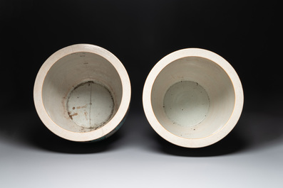A pair of Chinese Nanking famille verte 'warriors' fish bowls, 19th C.