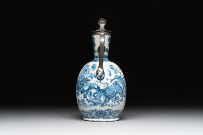 A Dutch Delft blue and white pewter-mounted armorial jug, late 17th C.