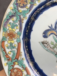 A pair of Chinese famille rose 'botanical' plates after Maria Sybilla Merian, Qianlong