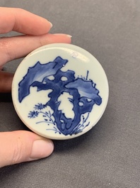 A Chinese blue and white jar and cover with birds among flowering branches, Transitional period