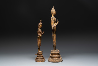 Two Thai mica-inlaid gilt bronze standing Buddhas in Rattanakosin-style, 19th C.