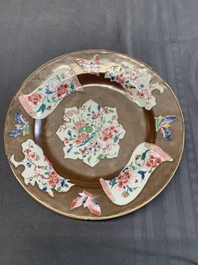 A Chinese famille rose dish, a teapot, a milk jug and a cup, Yongzheng/Qianlong