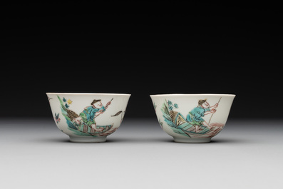 A pair of Chinese famille rose 'beloved by the river' cups and saucers, Yongzheng