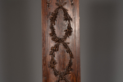 Two ornately carved pine and walnut panels, France, 18th C.