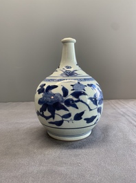 Three Japanese blue and white Arita 'birds among flowering branches' pharmacy bottles, Edo, 18th C.