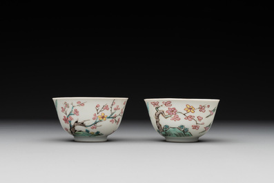 A pair of Chinese famille rose 'beloved by the river' cups and saucers, Yongzheng