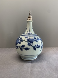 Three Japanese blue and white Arita 'birds among flowering branches' pharmacy bottles, Edo, 18th C.