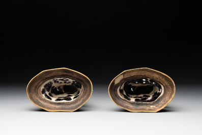 A pair of turquoise- and aubergine-glazed parrots with gilt bronze mounts, Kangxi