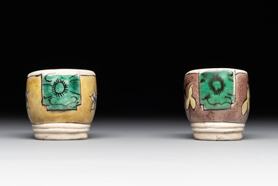 Two Chinese sancai-glazed shoes with flowers and butterflies design, Kangxi