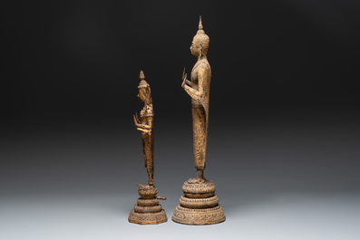 Two Thai mica-inlaid gilt bronze standing Buddhas in Rattanakosin-style, 19th C.