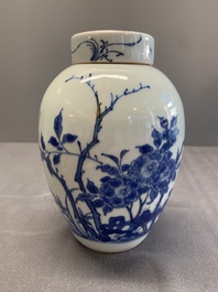 A Chinese blue and white jar and cover with birds among flowering branches, Transitional period