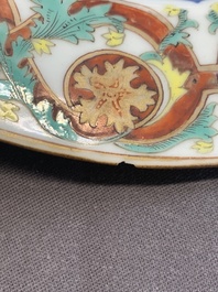 A pair of Chinese famille rose 'botanical' plates after Maria Sybilla Merian, Qianlong